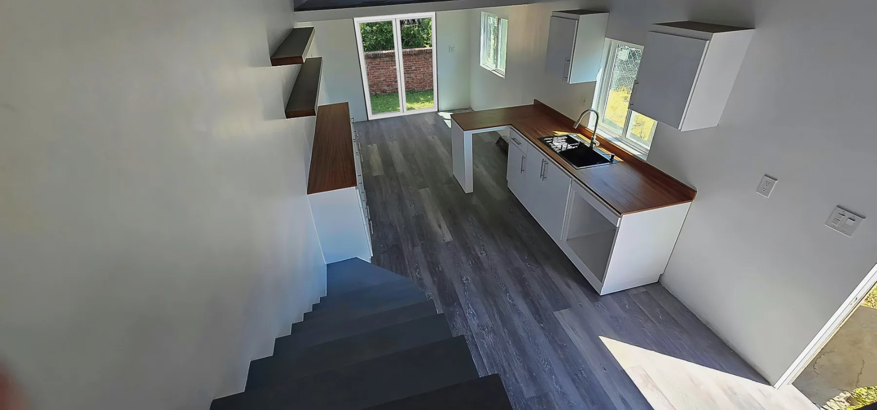 The Malibu Luxury Tiny Home Interior and stairs